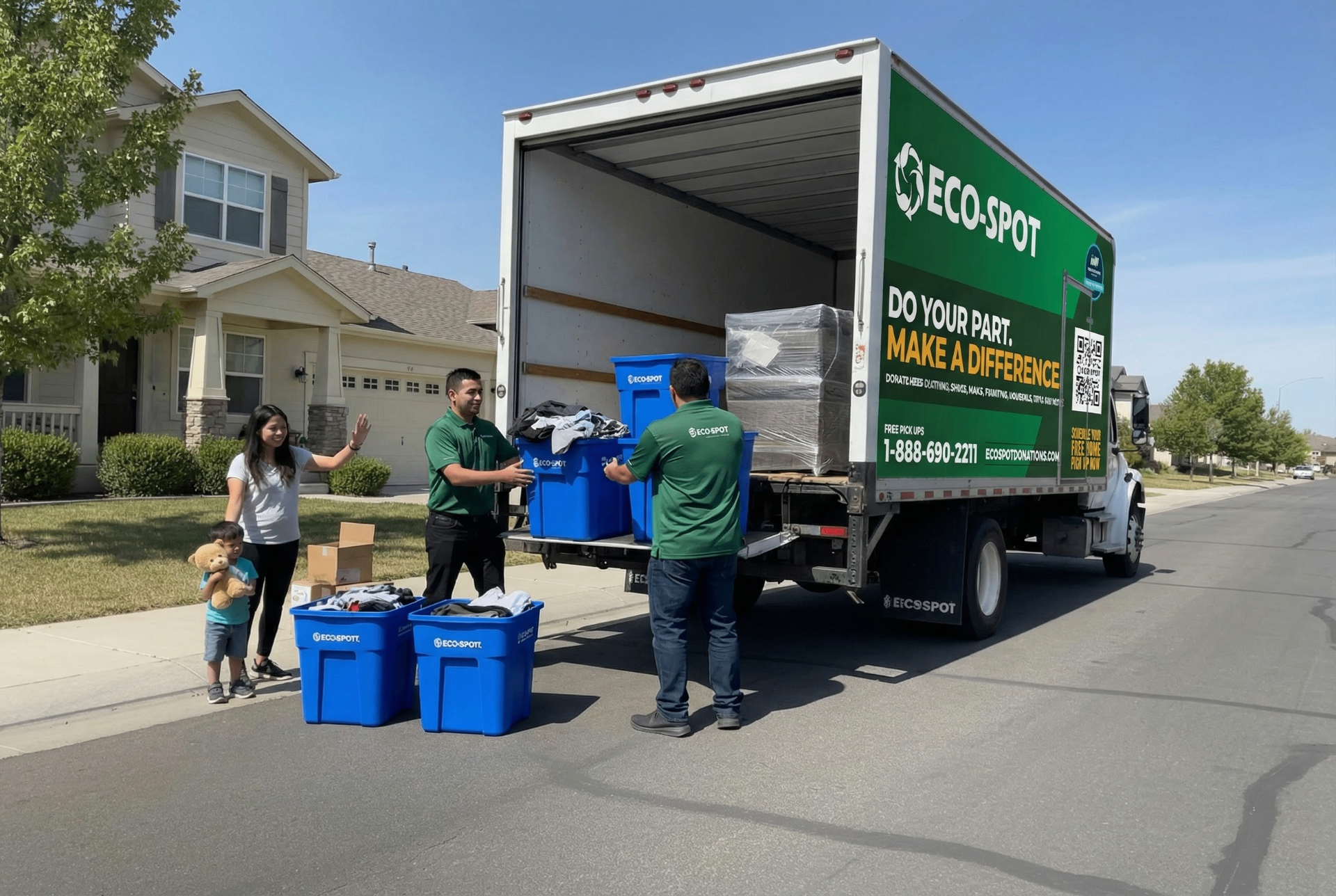 An Eco-Spot Donations branded box truck on the highway with the call to schedule a free home pickup